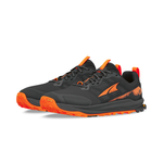 The Altra Men's Lone Peak 9+ Trail Runners combine a black and orange design with a textured Vibram® Megagrip sole, reflective accents, lace-up closure, and Altra EGO™ cushioning for responsive comfort.