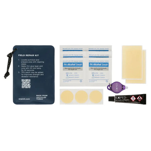 The Exped Field Repair Kit by Exped includes a fabric pouch, two alcohol swabs, three circular patches, two rectangular patches, an adhesive tube, and a small purple tool for equipment repair.