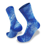 Experience the Wilderness Wear Flinders Ranges Cool Hiker socks, showcasing a blend of blue hues with abstract dark blue line patterns. Designed by Wilderness Wear for enhanced moisture management, these lightweight socks exhibit sophistication and comfort from multiple angles while ensuring breathability for your hiking adventures.