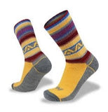 A pair of yellow and grey Wilderness Wear Merino Fusion Max Socks with colorful patterns, including stripes and geometric designs, featuring Climayarn technology and a reinforced heel and toe, displayed against a plain white background.