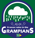 Designed by Machine Printers, the Absolute Outdoors Men's "It Never Rains In The Grampians" Tee features a stylized logo of clouds and raindrops above mountains, with a small "GPT 100 Miler" label at the bottom to emphasize the endurance spirit of this Autism Support Service initiative.