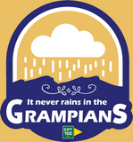 Featuring a chic logo with a cloud and rain design, the Absolute Outdoors Women's "It Never Rains In The Grampians" Tee by Machine Printers showcases the phrase, supporting an exclusive release for Autism Support Service.