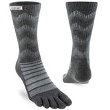 A pair of Injinji Outdoor Midweight Crew socks with a chevron pattern made of Merino wool construction.