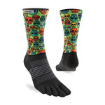 A pair of Injinji Spectrum Trail Women's Midweight Crew socks with colorful skulls, perfect for women.