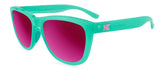 A pair of Knockaround Premium Sport Sunglasses in turquoise with pink mirrored lenses.