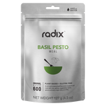 A silver package labeled "Radix Original 600kCal Meals," 127 grams, showcases the freeze-drying process for a plant-based and gluten-free, ready-made meal with water. This Radix product ensures convenience and nutrition in every bite.