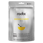 A silver package labeled "Radix Original 600kCal Meals" from Radix highlights its plant-based and gluten-free qualities. This ready-to-eat, mild Indian curry meal includes chickpeas, quinoa, vegetables, and herbs. The freeze-dried meal has a net weight of 133g.