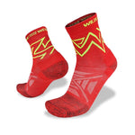 Red athletic Wilderness Wear Atmosphere Q Trail Socks with yellow zigzag patterns and "WILDERNESS WEAR" text on the top, made from Climayarn for blister-preventing comfort, displayed from different angles against a white background.