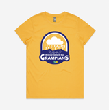 The Absolute Outdoors Women's It Never Rains In The Grampians Tee by Machine Printers is a yellow T-shirt showcasing a cloud and raindrops graphic, accompanied by the text "It never rains in the Grampians." This exclusive item benefits Autism Support Service.