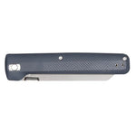 The Gerber Pledge by Gerber is a closed folding pocket knife with a textured dark handle, shown from the side with visible hinge, screws, and a sturdy pocket clip.