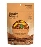 A package of Real Meals - Mexi Nachos by Real Meals, featuring the meal’s image and labeled with cheese, Soldaderas beans, sour cream, and organic corn chips.