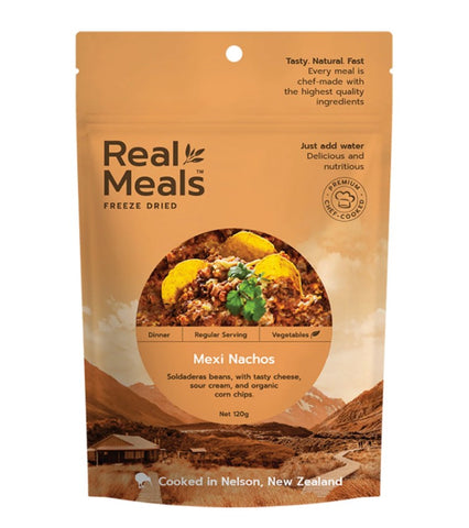A package of Real Meals - Mexi Nachos by Real Meals, featuring the meal’s image and labeled with cheese, Soldaderas beans, sour cream, and organic corn chips.