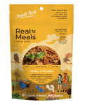 A yellow and brown pouch labeled “Real Meals - Oodles of Noodles” from Real Meals shows freeze-dried chicken ramen noodles, with birds, a river, and preparation details featured on the packaging.