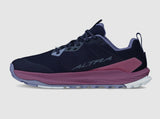 The Altra Women's Lone Peak 9+ Trail Runners are navy and purple shoes with bold ALTRA branding and a rugged Vibram® Megagrip sole, ideal for trail running.