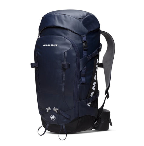 A Mammut Trion Spine 35ltr hiking backpack in navy blue, complete with Active Spine Technology, adjustable straps, and multiple compartments, perfect for alpinist adventures.