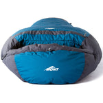 A blue and gray Mont Brindabella 700 down sleeping bag by Mont, viewed from the front with a partially unzipped hood, displayed on a white background, showcasing its Hydronaute XT fabric.