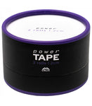 A round container of Crux Power Climbing Finger Tape by Crux Climbing in black and purple, featuring the text "2 rolls 1.2cm" on the lid. This durable adhesive tape provides excellent finger protection, making it perfect for climbing enthusiasts seeking reliable support.