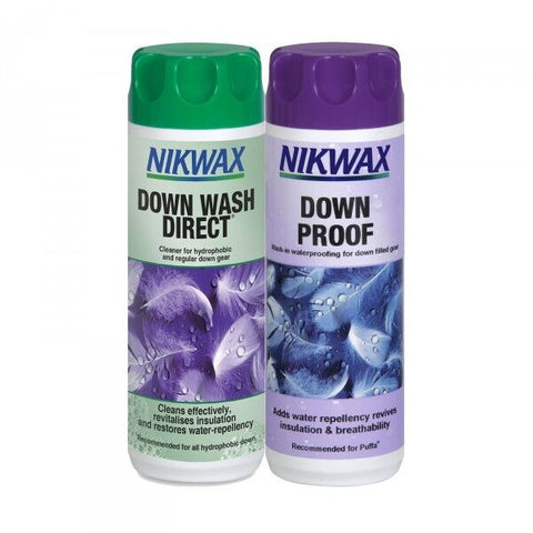 The NikWax Down Wash + Down Proof Twin Pack by NikWax includes two products: one green-labeled Down Wash Direct cleaner and one purple-labeled Down Proof for revitalizing insulation and adding water repellency to down-filled gear.