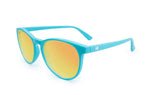 A pair of Knockaround Mai Tai sunglasses with turquoise frames and yellow tinted, UV400 protection lenses, isolated on a white background.