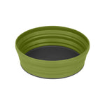 The Sea to Summit XL X Bowl, made of food-grade silicone with a black base, is shown fully expanded. This green collapsible bowl from Sea To Summit features measurement markings on the inside.