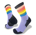 A pair of Wilderness Wear Bamboo Multisport Socks in purple with black heels and toes, featuring horizontal rainbow stripes near the top, offers advanced technology for enhanced breathability.