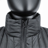 Close-up of a black mannequin wearing a 3 Peaks Men's Down Jacket with a high collar. The zipper is partially undone, and the quilted fabric offers high warmth and water repellency.