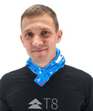A person wearing a black T8 shirt and a blue patterned T8 Ice Bandana, standing against a plain white background for ultimate running comfort.
