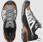 A pair of Salomon Men's X Ultra 360 GTX in gray, white, and orange with black laces and rugged Contagrip soles, viewed from the top and side. The Salomon logo is visible on the tongue and heel, making them perfect as a stylish hiking shoe.