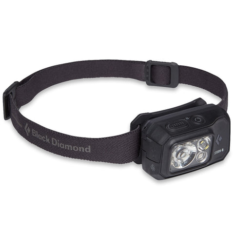 A Black Diamond Storm 500 Rechargeable Headlamp with a strap for outdoor lighting.
