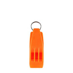 The Lifesystems Hurricane Whistle, an orange plastic whistle with a metal keyring attached at the top, features two air chambers that produce a tri-tone sound. Designed by Lifesystems to perform in all weather conditions, it is one of the loudest whistles available and is displayed against a white background.