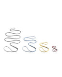 Colorful, abrasion-resistant Black Diamond paperclips arranged in a wavy pattern on a white background.