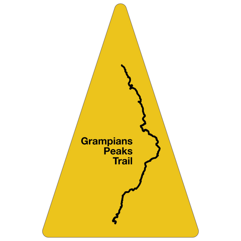 An Absolute Outdoors GPT Route Map Trail Marker Sticker, consisting of a yellow triangle with the words "Graham's Peak Trail" on it.