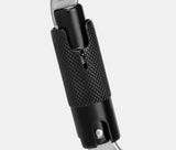 Close-up of the Mammut Classic HMS Twistlock Plus Carabiner by Mammut, showcasing its black and silver textured design, ergonomic shape, spring mechanism, and twist-lock closure.