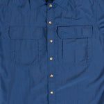 A Mont Men's Lifestyle Vented Shirt in blue with buttons on the front that offers UV resistance.