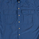 A Mont Men's Lifestyle Vented Shirt in blue with buttons on the front that offers UV resistance.