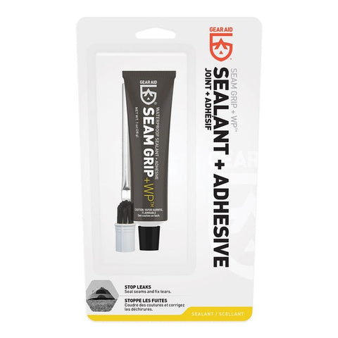 A packaged product labeled "Gear Aid Seam Grip Waterproof Sealant & Adhesive" featuring a tube of waterproof sealant accompanied by an applicator and cap, designed for sealing seams and fixing tears.