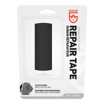 A black Gear Aid Tenacious Tape repair tape in a package, perfect for outdoor gear.