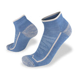 A pair of Wilderness Wear 10K Merino Socks made from merino wool.