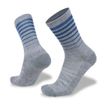 A pair of Wilderness Wear Merino Fusion Light Socks with grey and blue striped design and elasticated arch support.